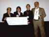 Board members presenting check to SPE